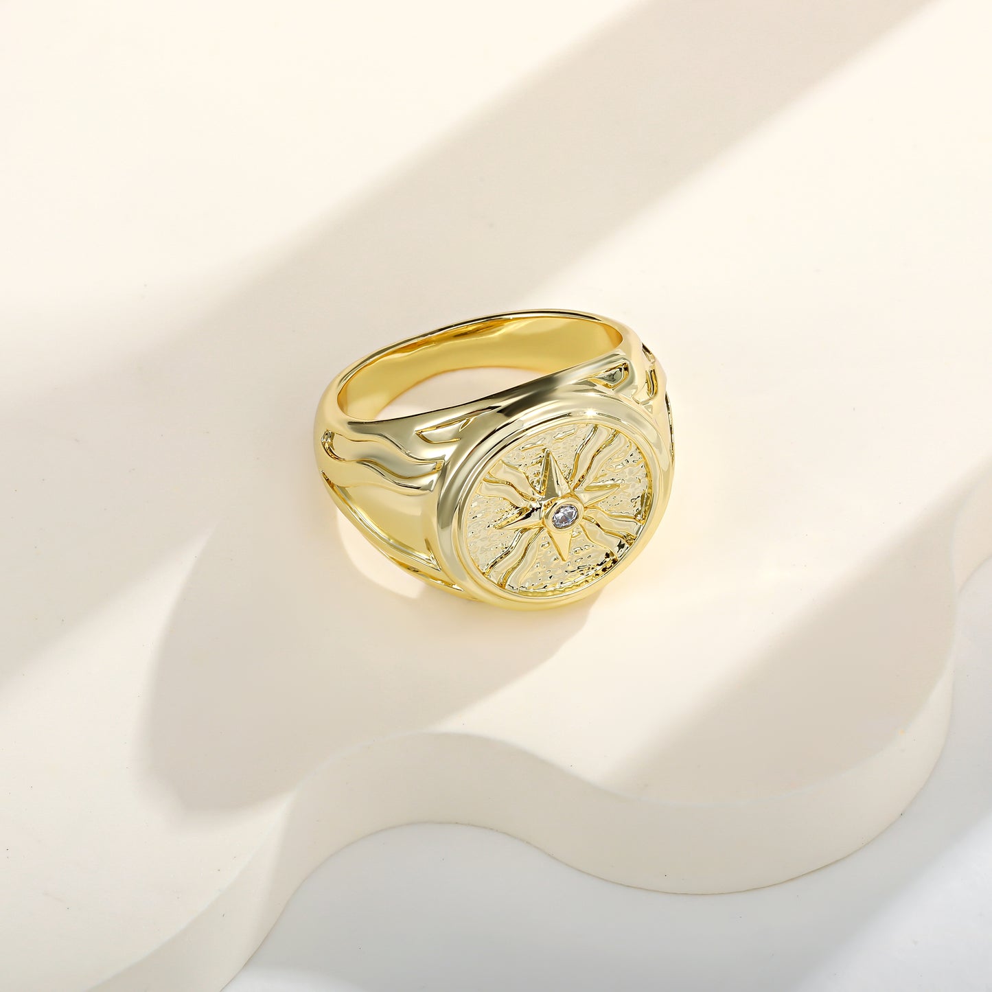 Elegant Assyrian ring styled with modern accessories, blending heritage and fashion.