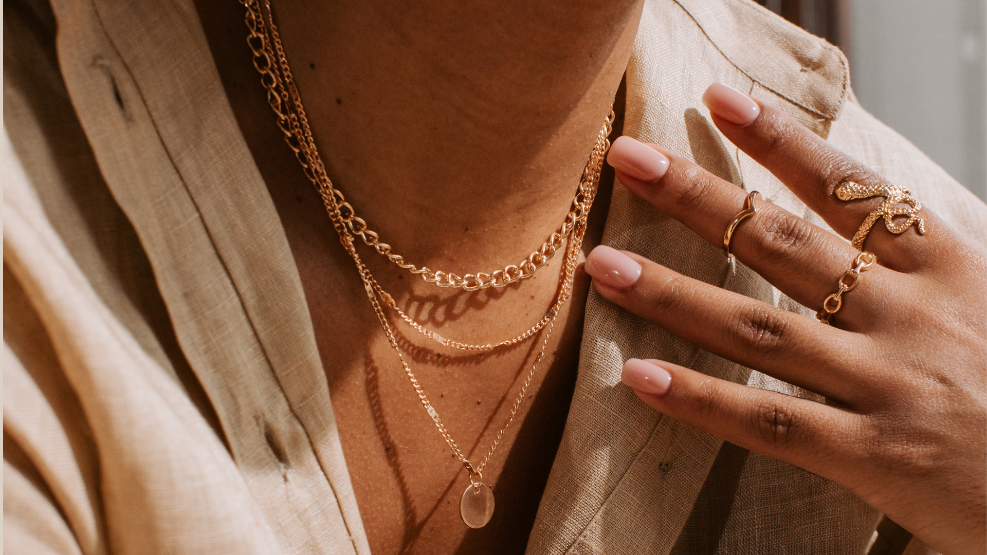 Banner showcasing jewelry from Gems Galore's 'Embrace Your Heritage' collection, featuring gold necklaces and rings